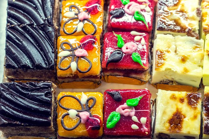 Private: Madrid Historic Centre Food Tour with 10+ Authentic - Stop 1: Historic pastry + 180-year deli classics to kick things off