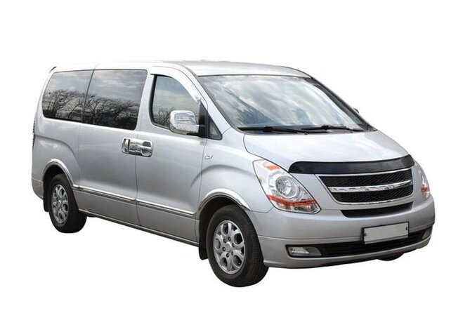 Private Transfer from Madrid Airport (MAD) - Meeting your driver at MAD: the sign, the hall, and the waiting clock