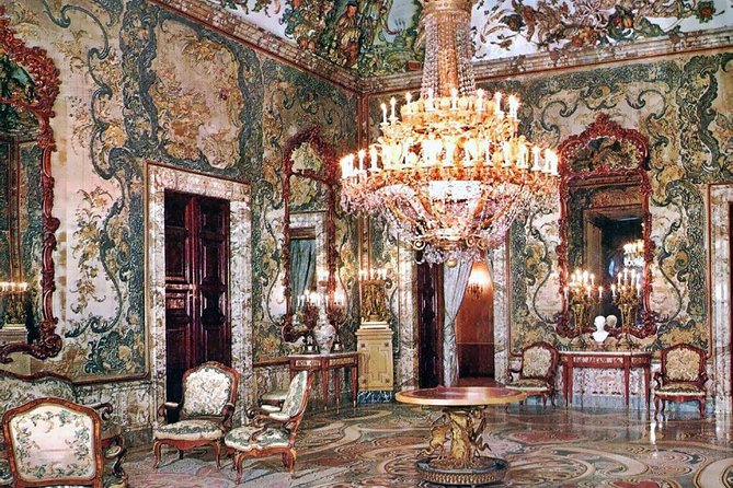 Royal Palace + Old City Madrid Exclusive Guided Walking Tour - Real Casa de Postas and Mercado San Miguel near Plaza Mayor