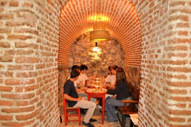 Secret Cave Wine & Tasting Experience in the Heart of Madrid - Entering the Marcelino Secret Cava Place in Madrid