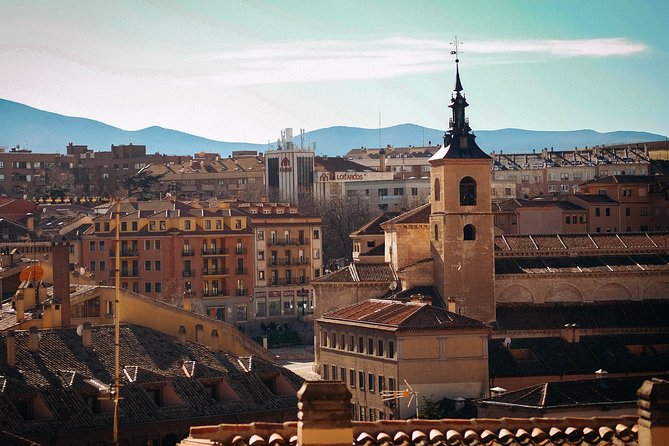 Segovia and Spanish Versailles Full-Day Tour with Wine Tasting - Plaza Mayor tasting: Segovian dessert, wine, and cheeses