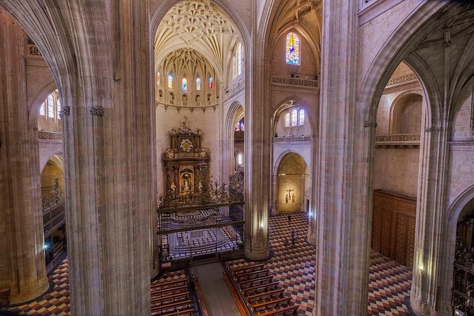 Skip the Line Admission Ticket to Cathedral of Segovia - The cloister door and Juan Guas’ older Gothic world