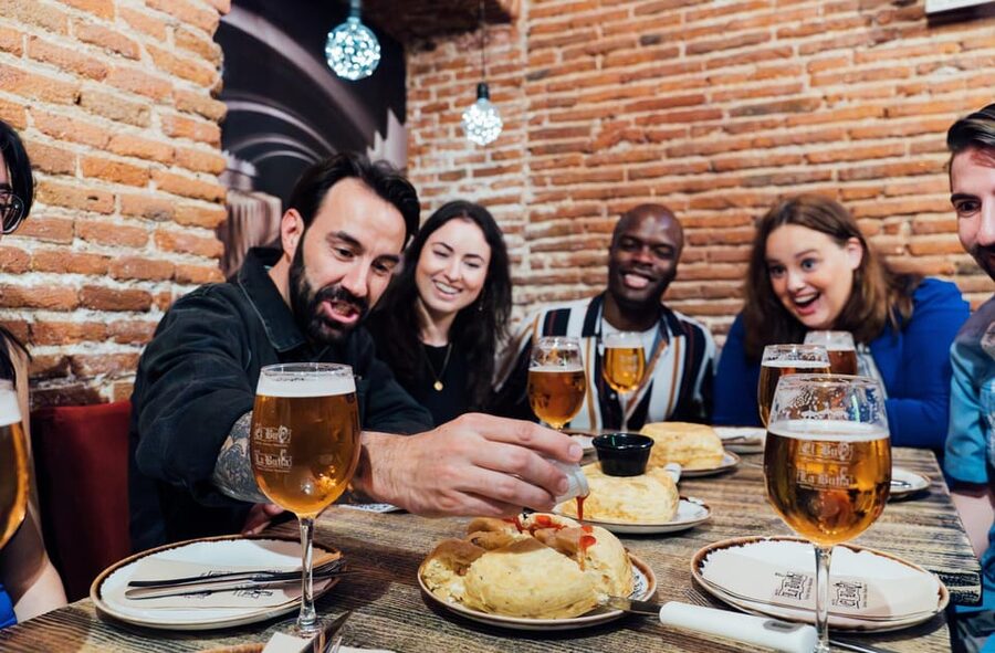 Tapas Food Tour with Dinner in Madrid - Entering La Latina: Plaza de los Carros to Madrid’s cobbled-food zone