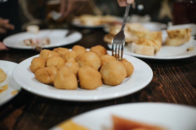 Tapas Tour Madrid Experience - Puerta del Sol and the Twelve Grapes clock ritual
