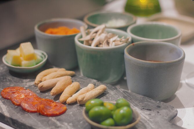 Taste of Spain: Tapas Cooking Class with Bottomless Wine Pairing - The seated dining room: a 6-course meal without the prep