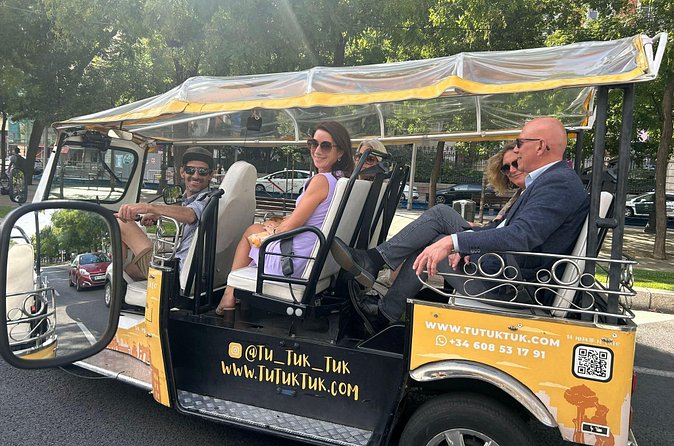 Tour of Castizo Madrid with a private guide in a yellow Tuk-Tuk - Mercado de San Miguel: Spanish food culture in one central stop