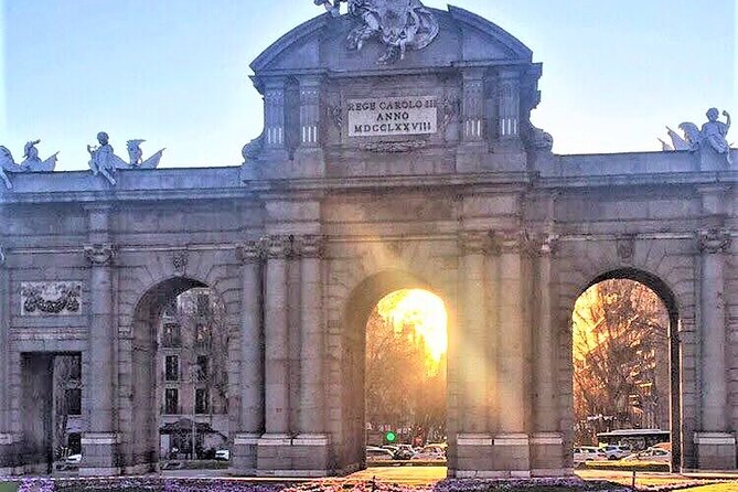 Tour of Historic and Modern Madrid with a guide in a yellow tuk tuk - Churches, a park pause, and a rose-garden moment