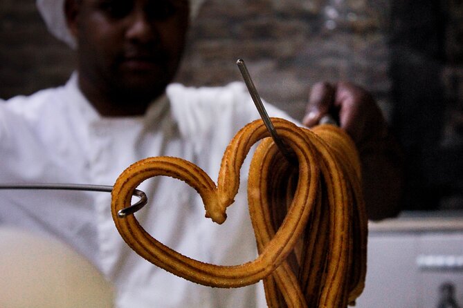 Try Madrid Best Churros, Tapas & Market by FLT - Stop 1: Fresh churros with chocolate or coffee, served with show-cooking